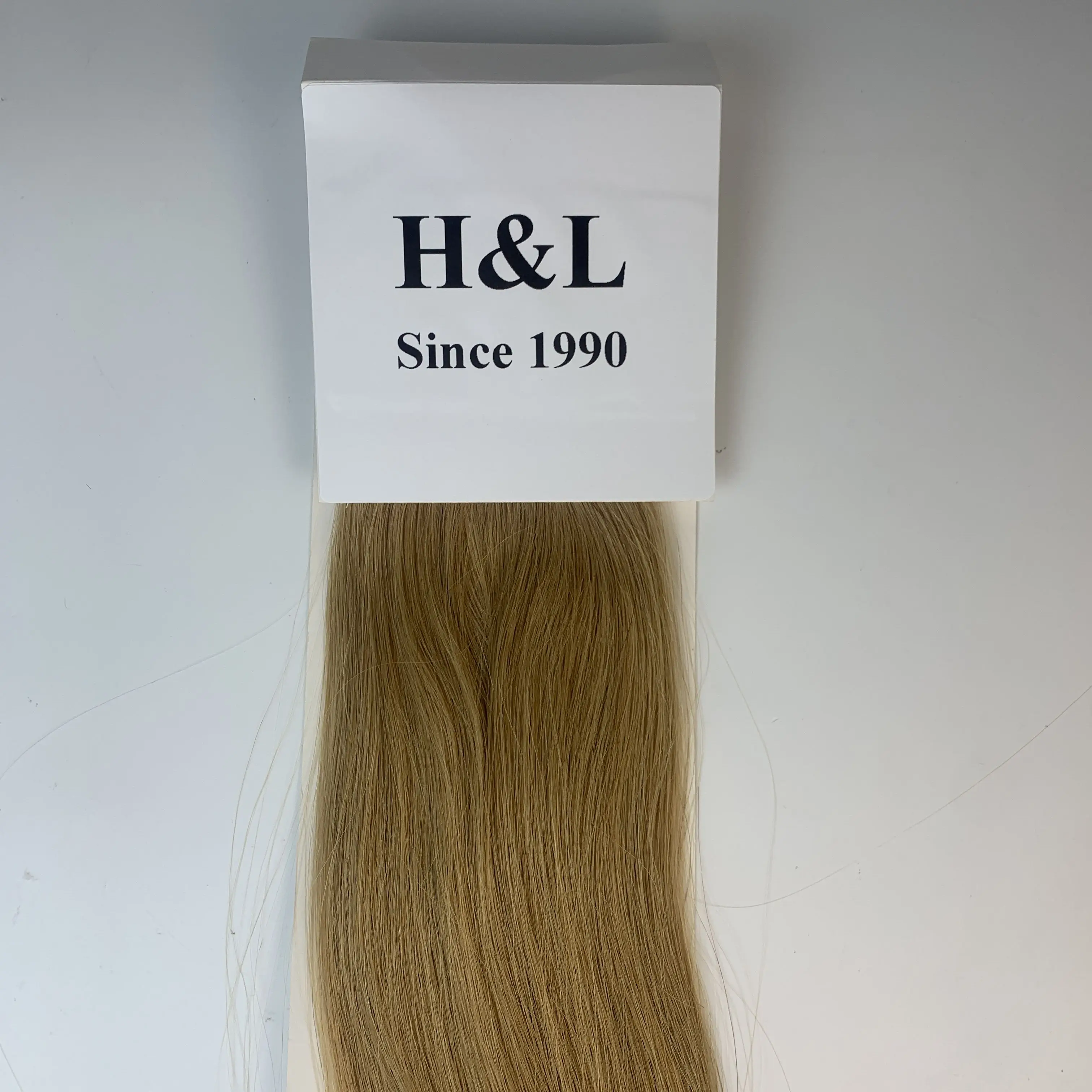 H & L с 1990 года поставляется завода высококачественные человеческие волосы накладные