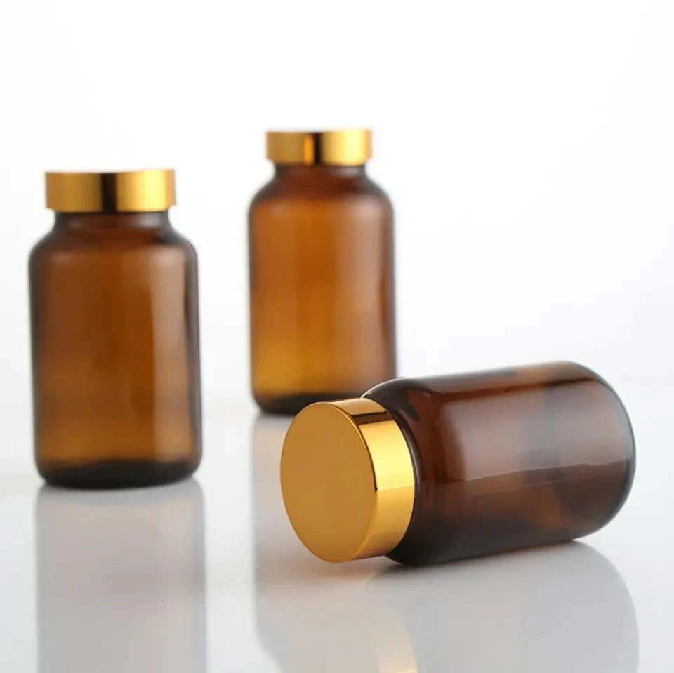 Factory Wholesale 60 80 100 120 150 200 250ml Tablets Pill Bottle With Gold Cap Amber Capsule Supplement Bottle