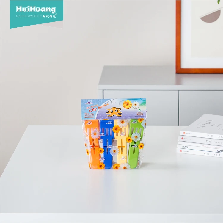 
factory direct sell windproof good quality 4pcs/set plastic beach towel clips wholesale large clothes pegs towel clips 