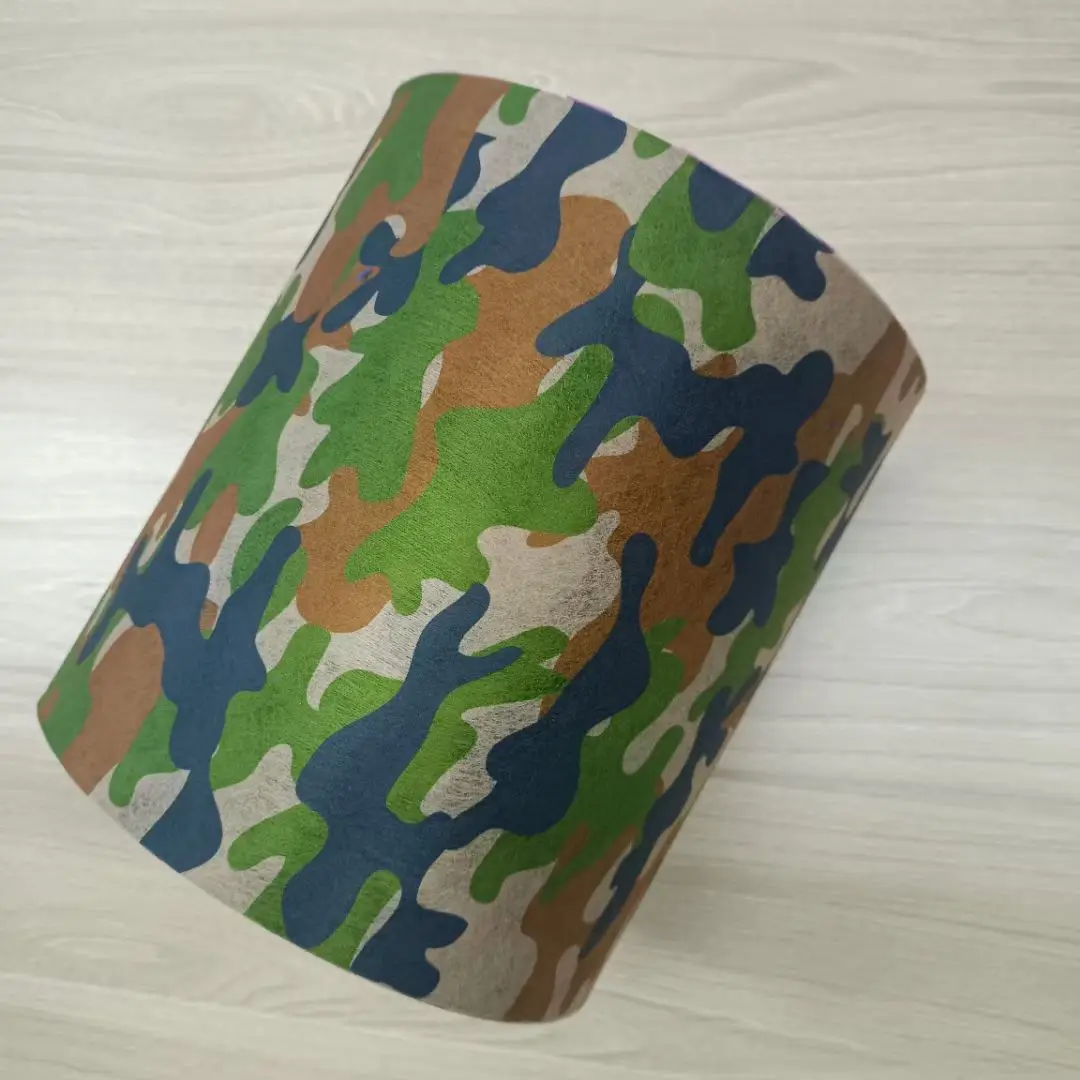 China Custom Pattern PP Spunbond Nonwoven Fabric 100%Polypropylene Mask Non Woven Fabric Rolls Manufacturer