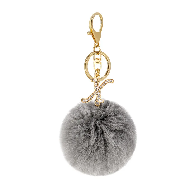 8cm popular new designs 26 English letters Keychain Faux Fur Pompon Keychain Women Rhinestone Leather faux Rabbit fur Ball