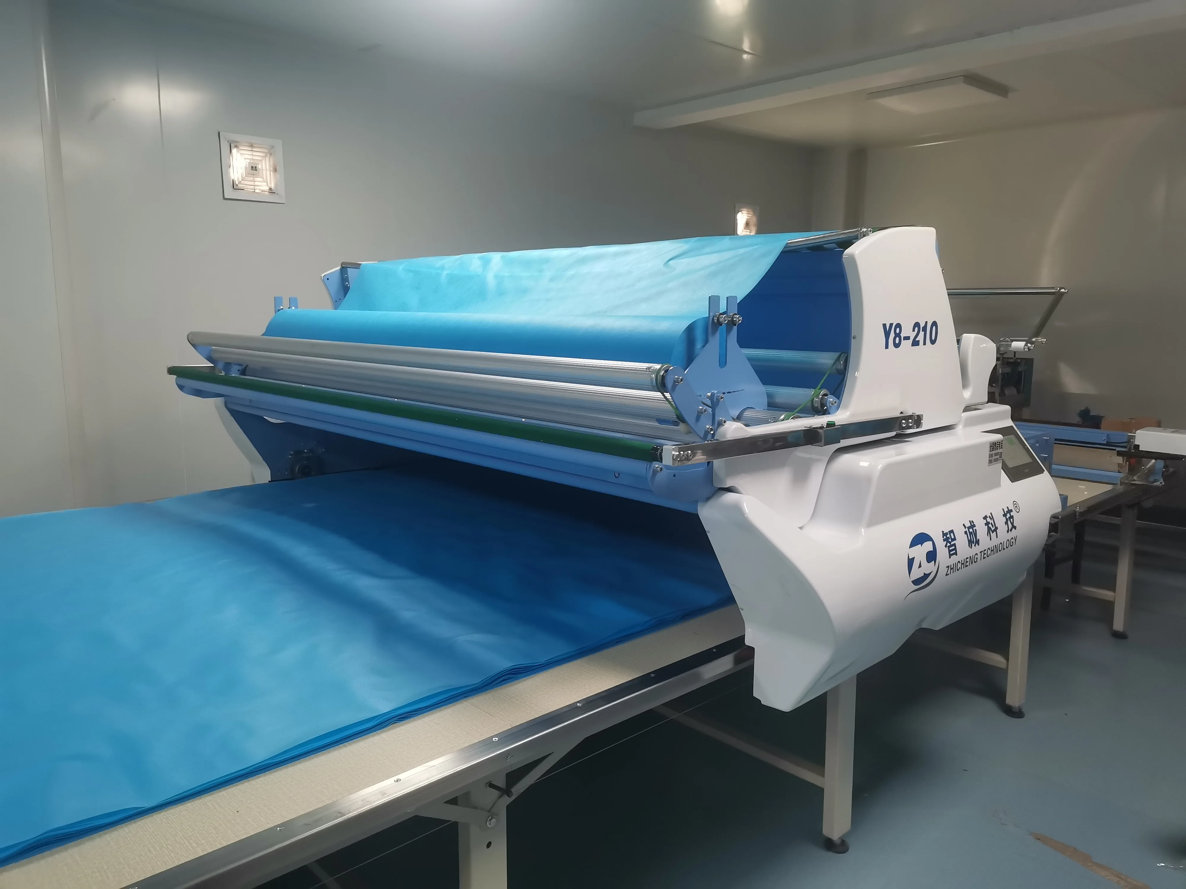 China Wholesale Apparel & Textile Machinery Automatic Fabric Spreader With Full Servo Motor Driving