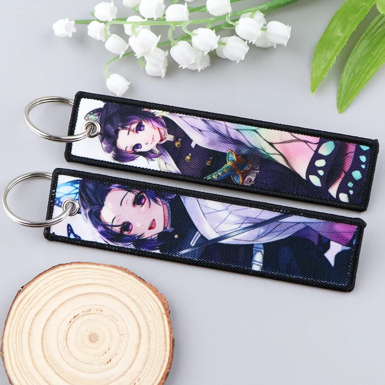 Оптовая продажа брелок с мультяшным реактивным ярлыком на заказ тканевый вышивкой в виде демонов