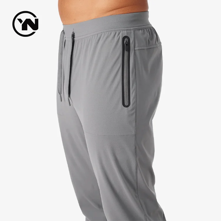 Custom Logo Light Weight Athletic Zip Pockets High Tech Nylon Stretchy Running Sweatpants Activewear Sports Gym Men Jogger Pants