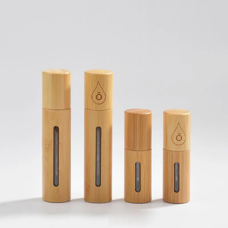 STOCK 5ml 10ml 15ml  10 ml glass bottle with roller and bamboo cap  bamboo packaging bottle roll on bottle