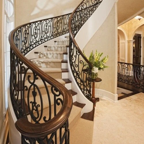 Australian Style Luxury Interior Marble Step Steel Beam Curved Stairs with Wrought Iron Railing from Foshan Factory