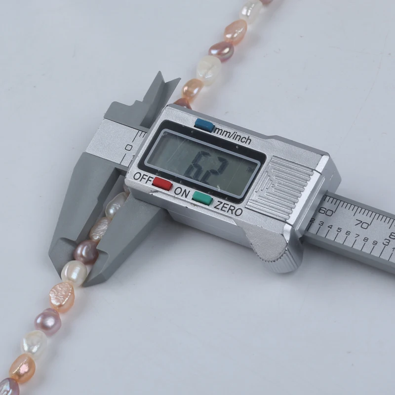 Zhuji 6-7mm White Pink Purple Natural Freshwater Baroque Shape Pearl Stand For Sale