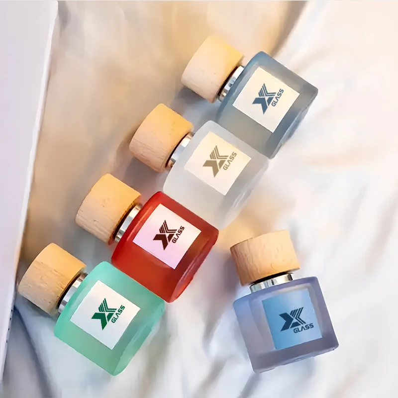 Wholesale rainbow color refillable glass perfume empty bottle with bottom refillable perfume bottle