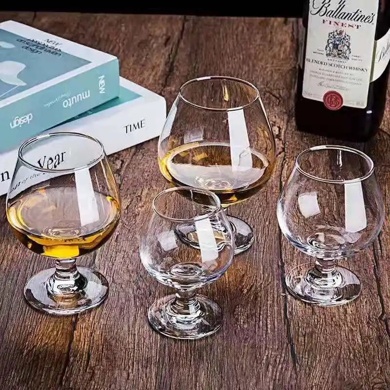 Hot vodka brandy frosted wine glass and brandy whisky glass goblet