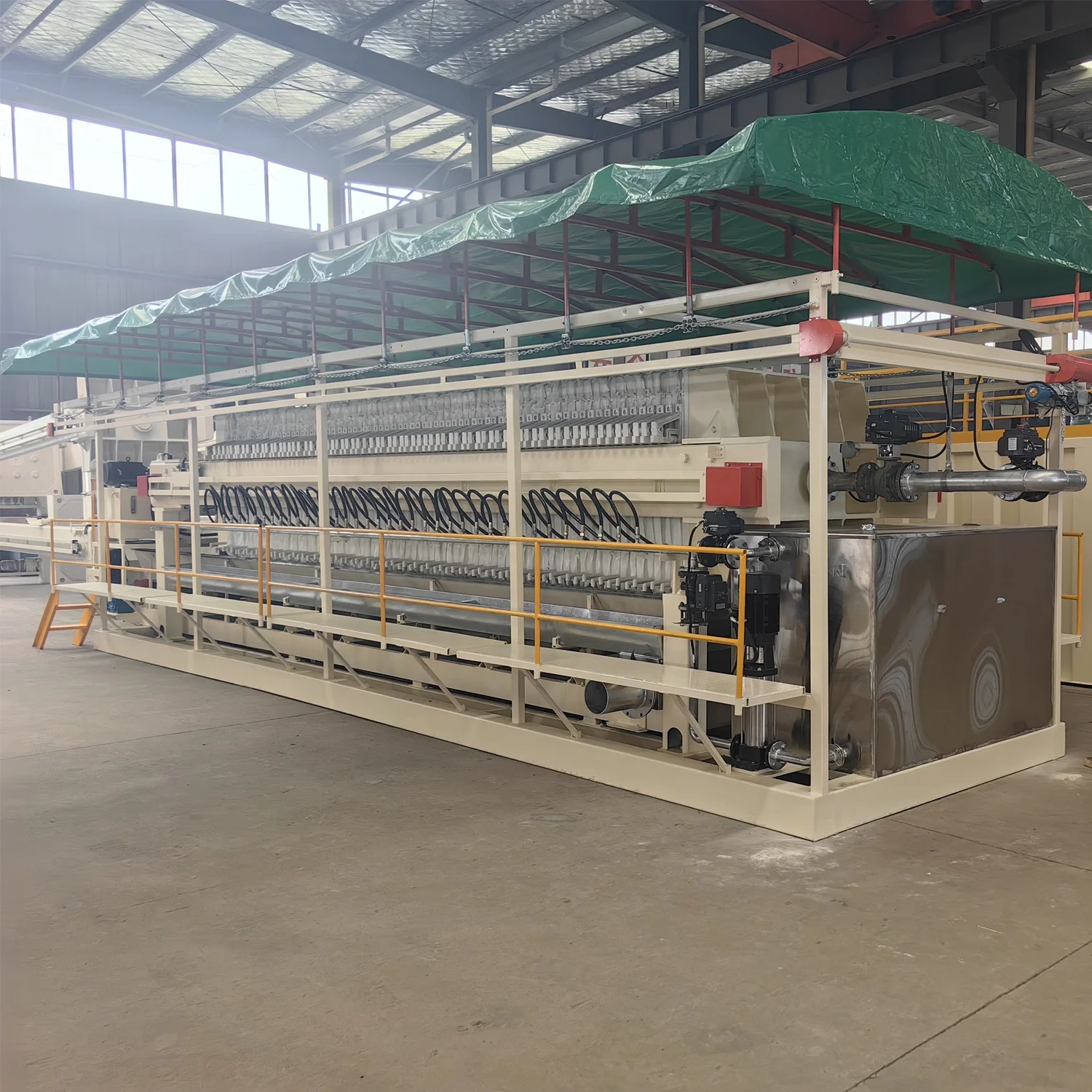 Automatic membrane filter press with belt conveyor and auto dosing flocculation device