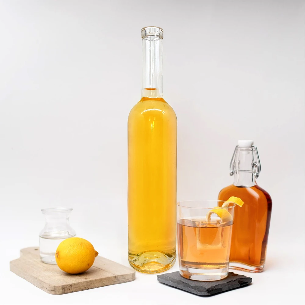 Factory direct sales Clear 750ml Premium bespoke Alcohol Rum Gin Vodka Whisky Whiskey Glass Bottle With Stopper