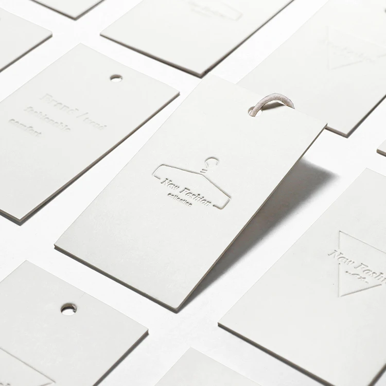 Top grade simple colorless gravure logo private label clothing product paper garment tags