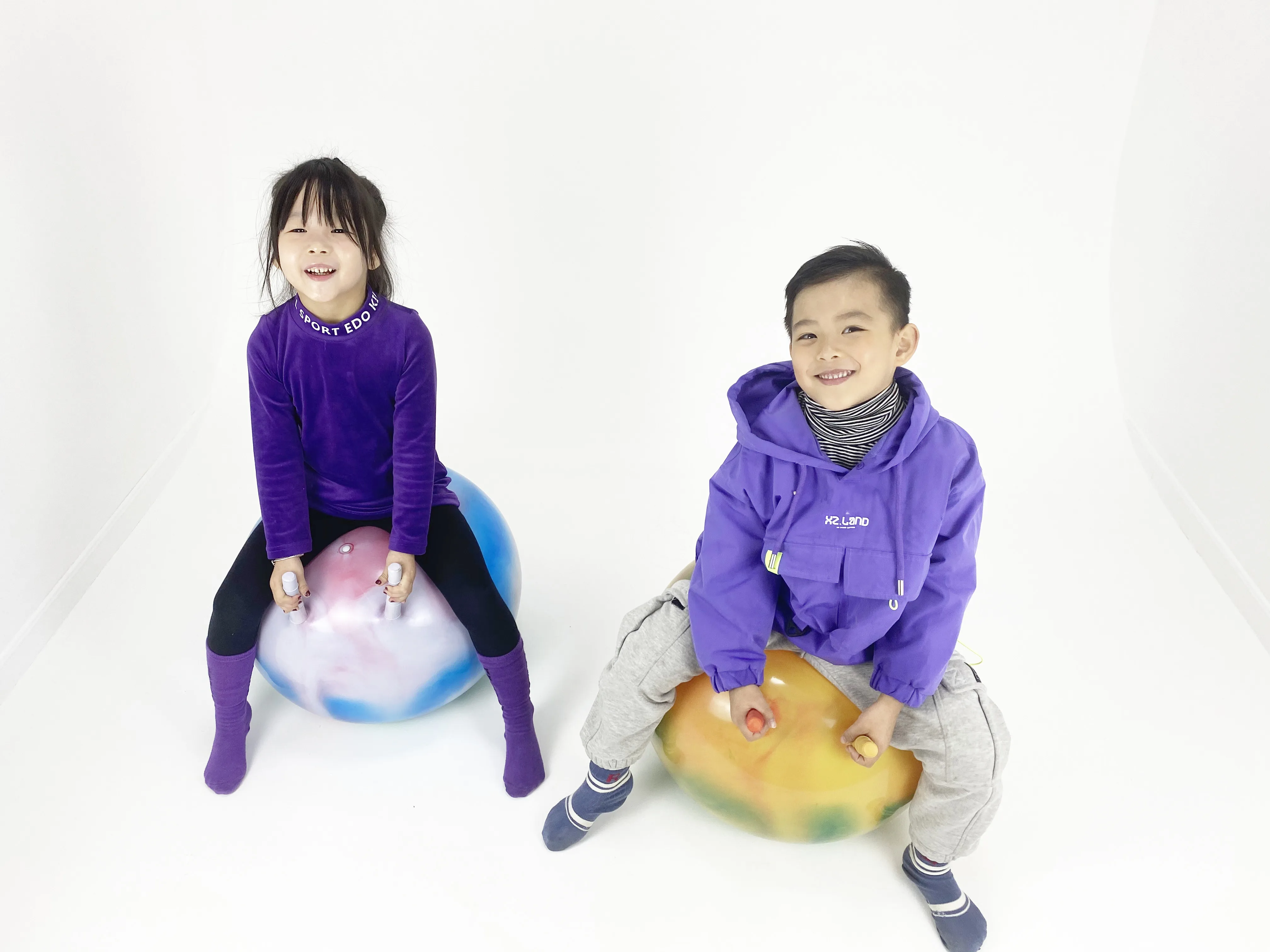 New Design Pvc Jumping Ball with Handle Tou for Children