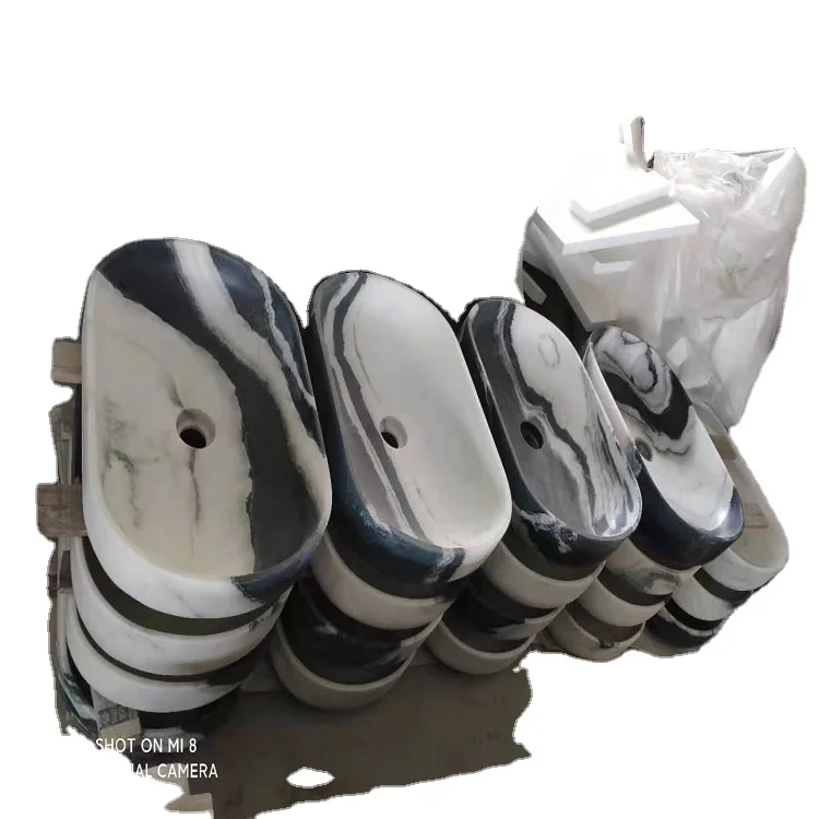 Белая кухонная раковина из мрамора