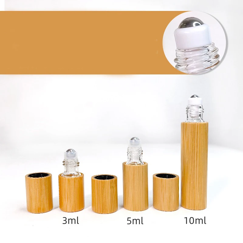 Оптовая продажа, прозрачный многоразовый стеклянный рулон эфирного масла на бутылке с бамбуковой крышкой