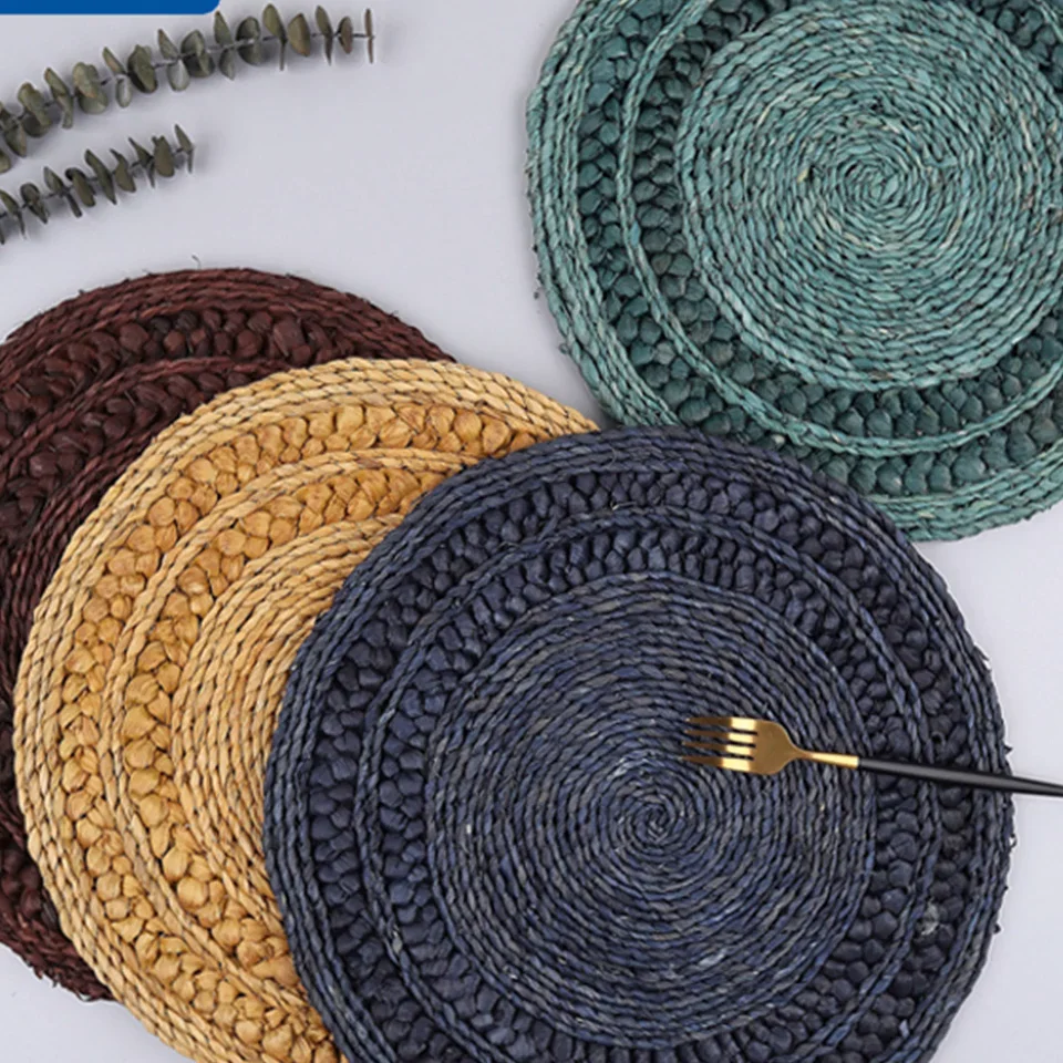 China wholesales natural corn bran weave placemat round braided rattan tablemats