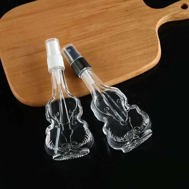 
Creative transparent glass spray bottle, violin perfume bottle Mini spot portable cosmetic packaging sub bottling 