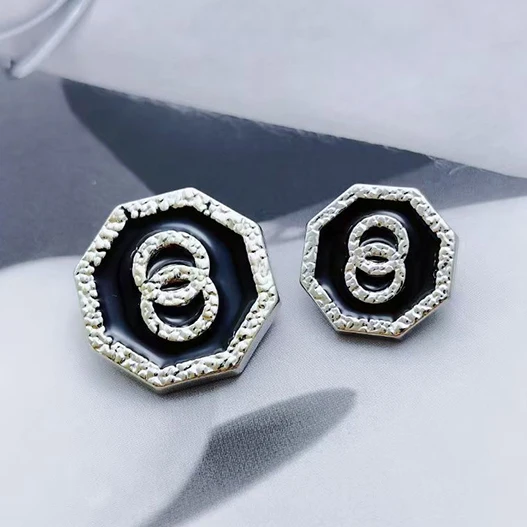 Custom design embossed logo octagon gold color black metal zinc alloy sewing women coat shank button