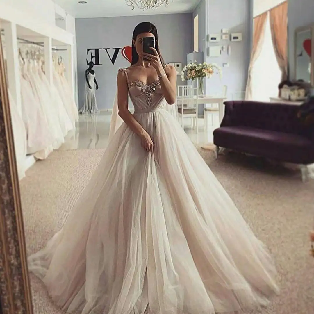 7612# Romantic Spaghetti Straps Wedding Dresses Sweetheart Lace Applique Sequined Sleeveless Ball Gown Bridal Tulle In Karachi