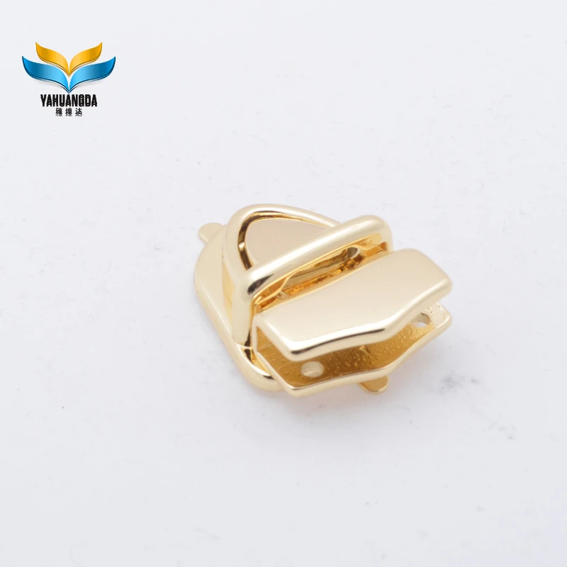 hot selling customized zinc alloy die casting plate lock light gold plating  push  lock  for handbags