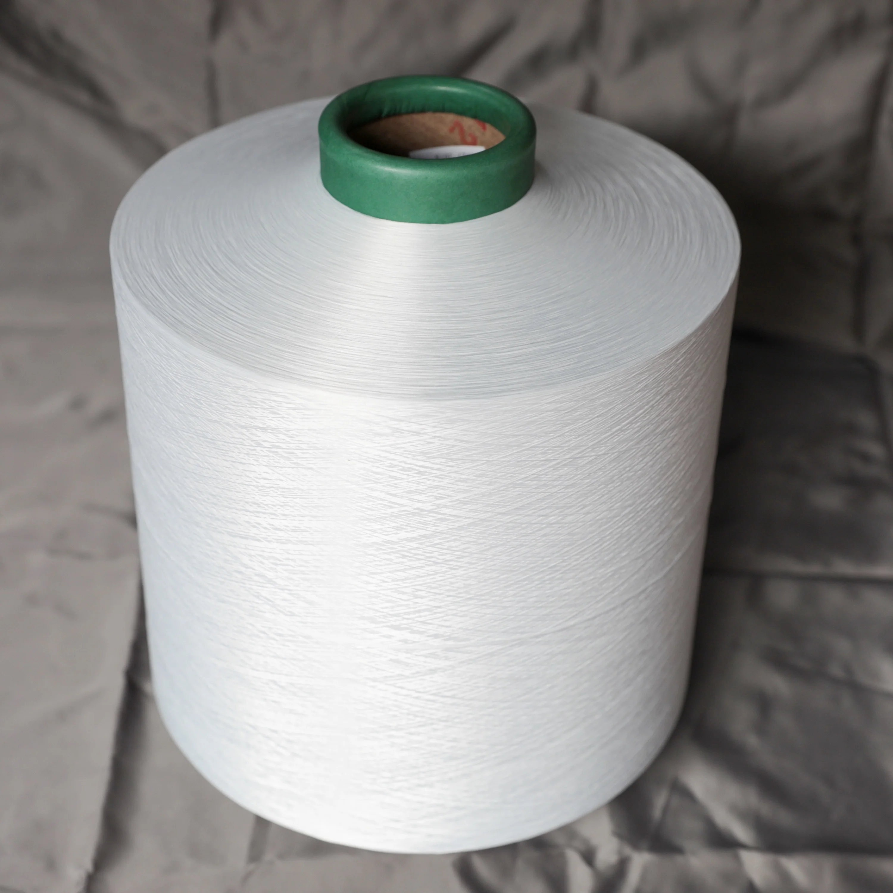 100PERCENT  POLYESTER TEXTURED YARN DTY  300D/96F SD RW NIM
