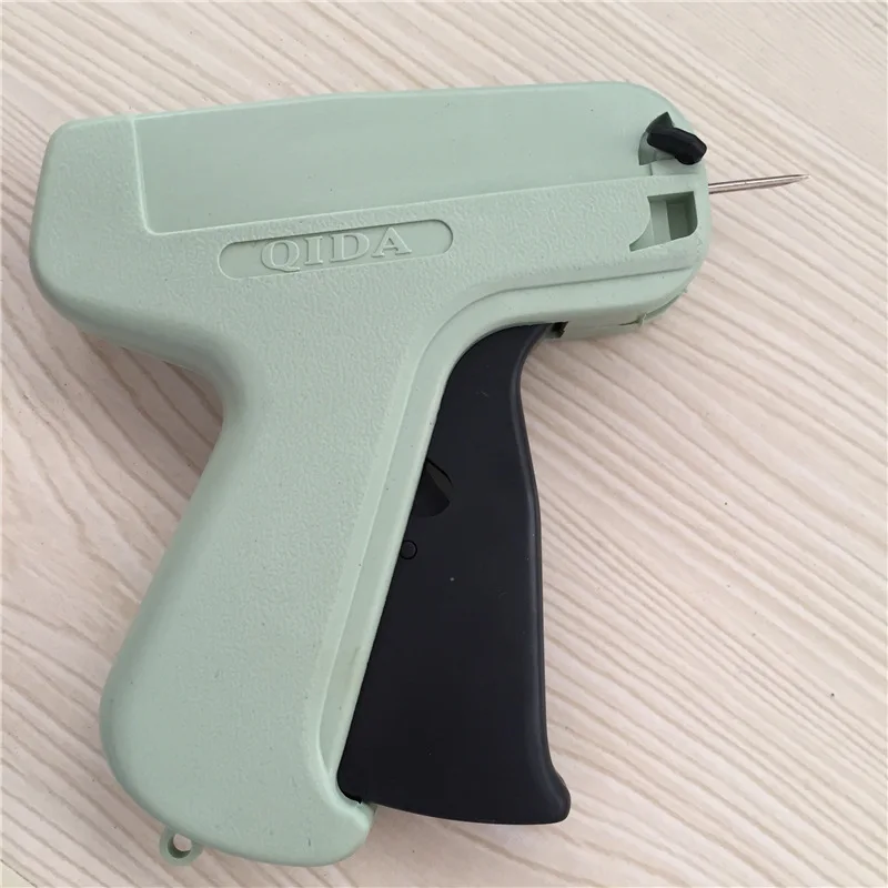 Factory supply wholesale needle clothing tag gun set trademark label gun for garment
