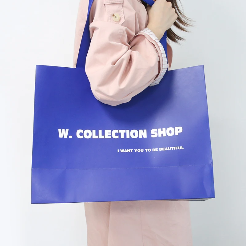 BTO wholesale oem black paper bag with ribbon boutiques shopping bags coated paper bag custom printed logo luxury clothing shop