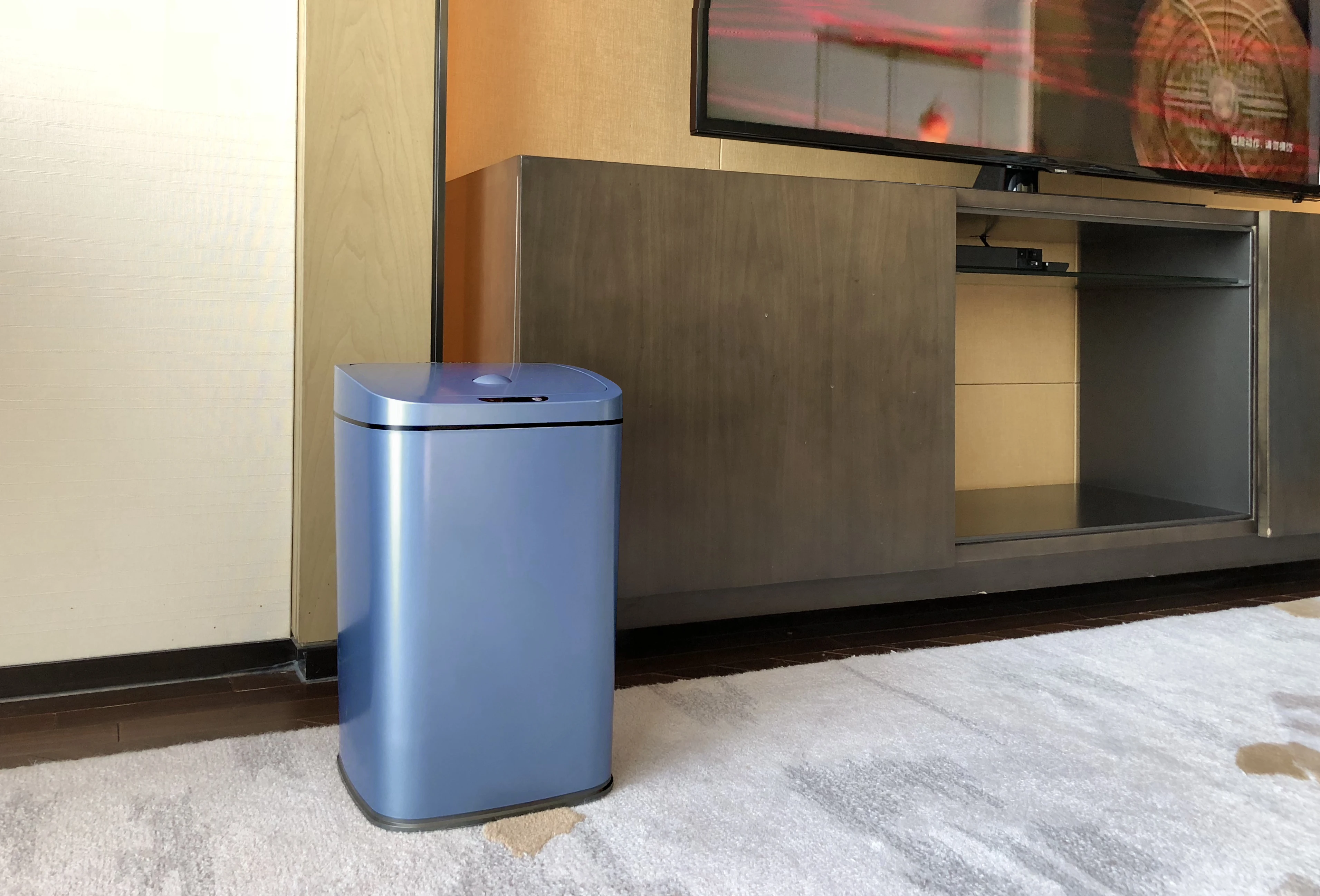 Clean and sanitary smart sensor trash bin in the bar High-tech electronic trash can