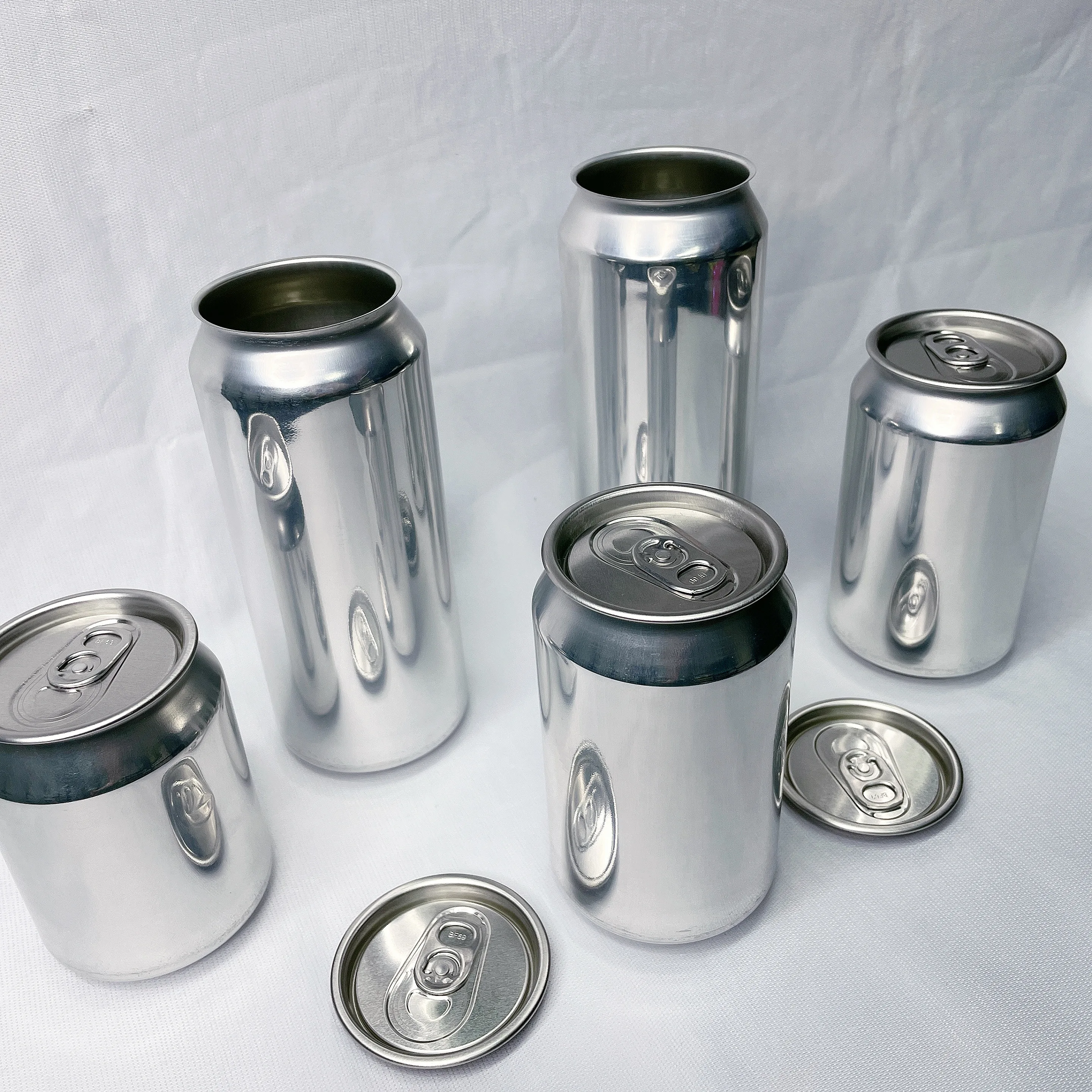 
Гладкие алюминиевые банки для напитков, пустые банки для напитков 12 унций 16 унций 330 мл 355 мл 473 мл 500 мл 