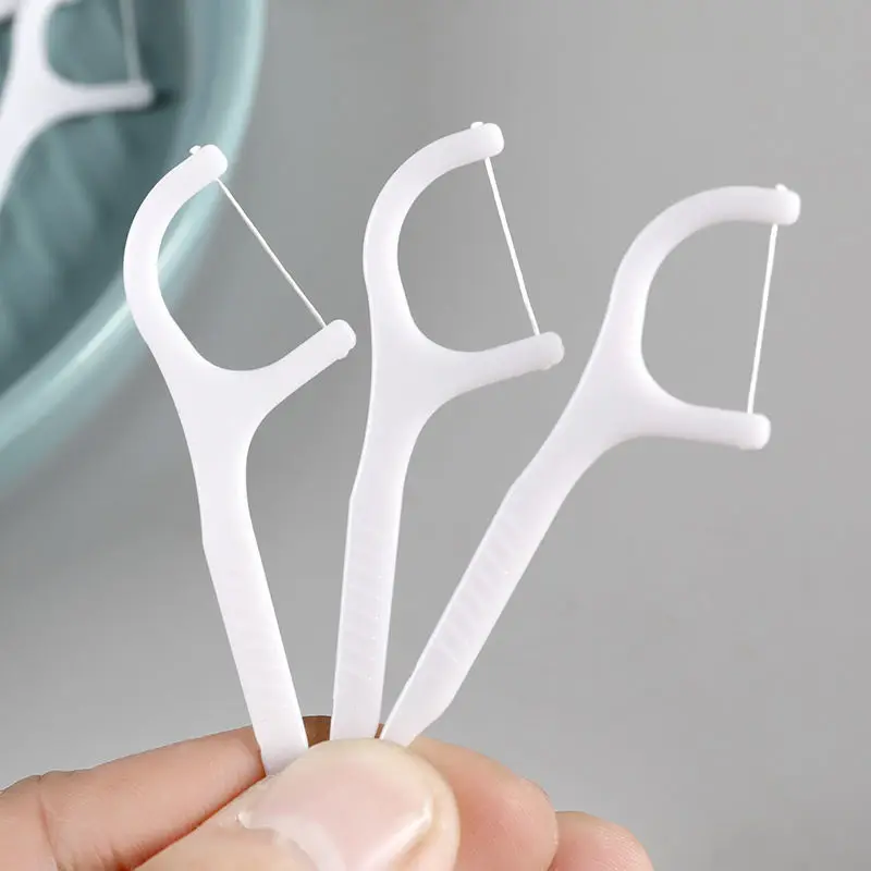 High quality 50pcs tooth care supplies Plastic Flosser Stick Dental Floss Pick
