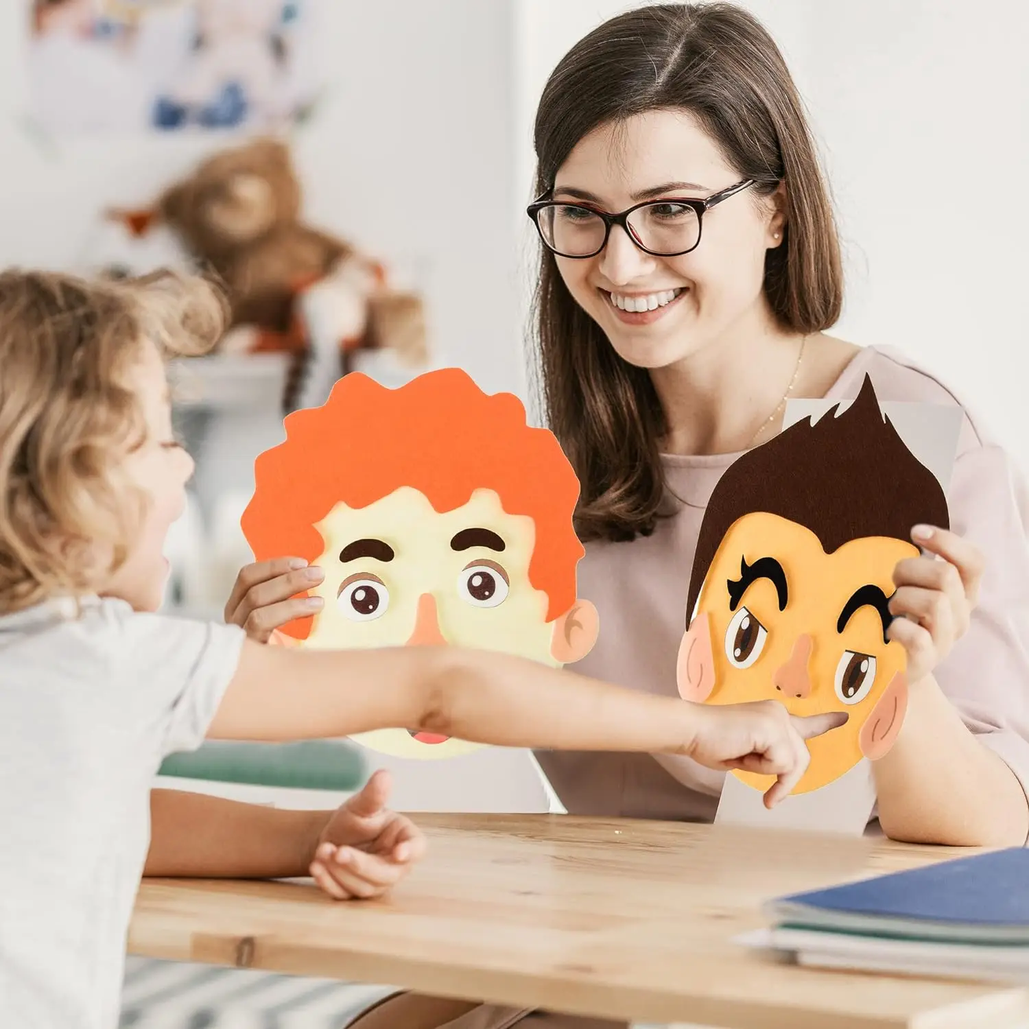 Kindergarten DIY teaching early education character change expression communication paste felt puzzle learning