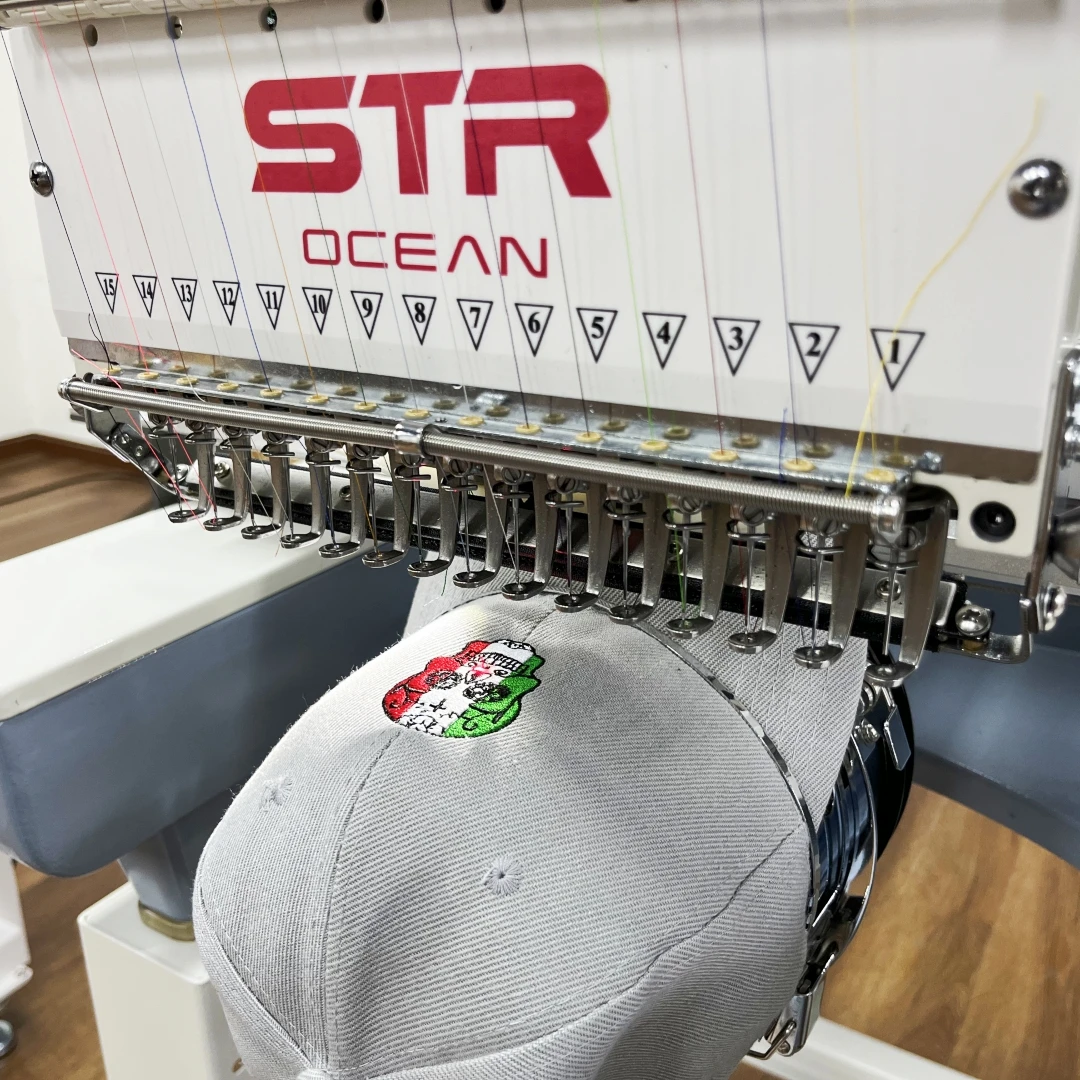 STR OCEAN single head Embroidery Machine with different languages like Chinese English France Spanish Russian etc