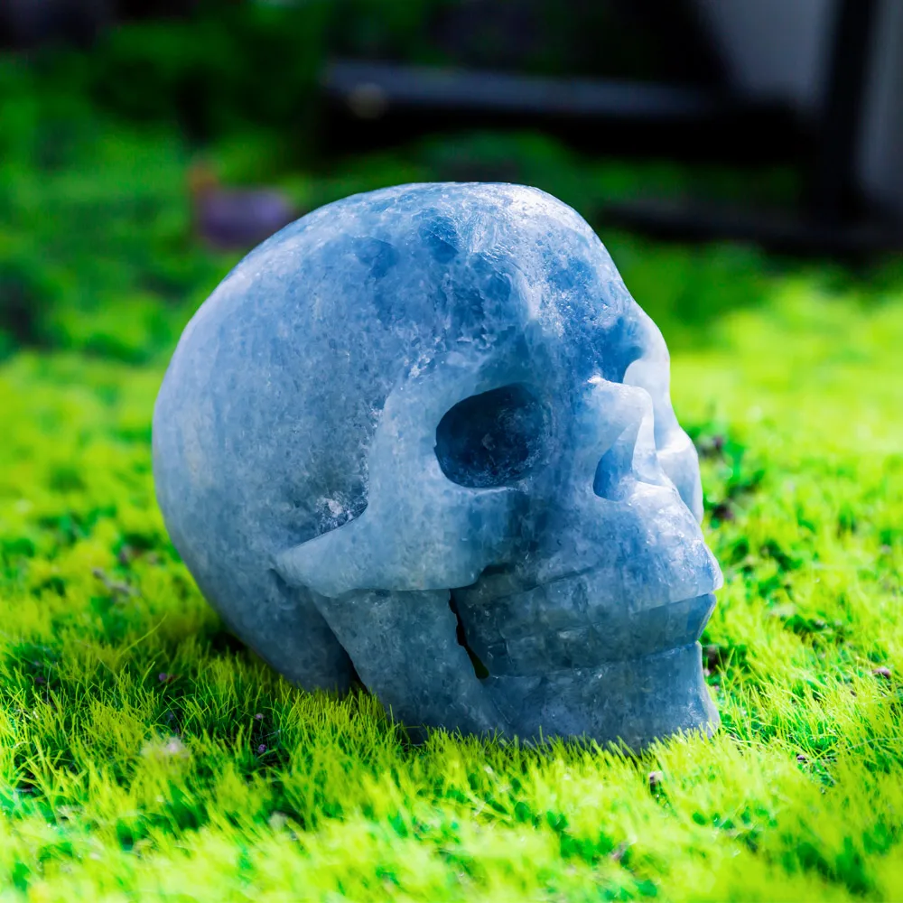 Wholesale natural high quality healing hand craved blue calcite crystal skulls crafts for home decoration