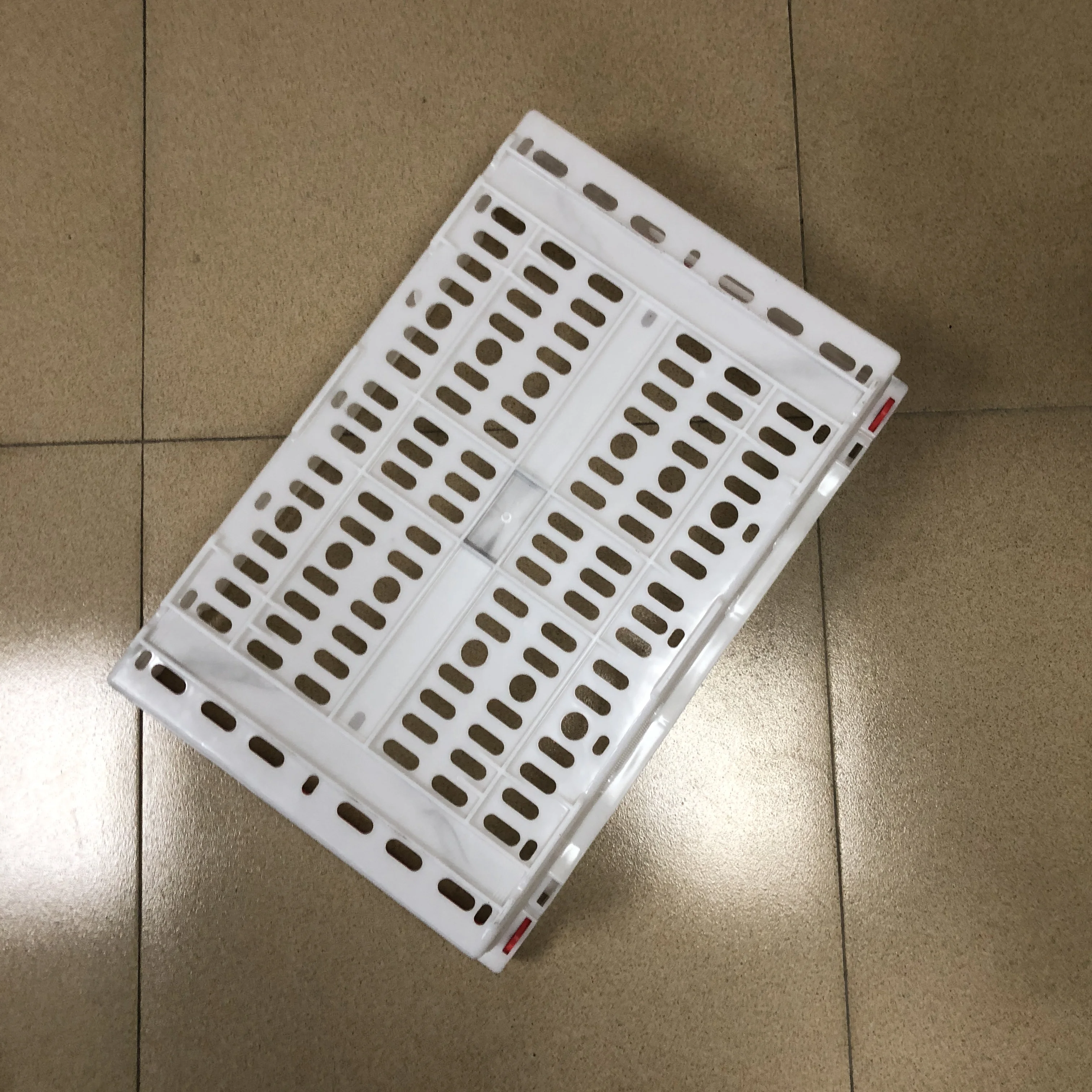 Stackable plastic boxes of fruits and vegetables for transporting mushrooms, grapes, etc. in supermarkets and farms