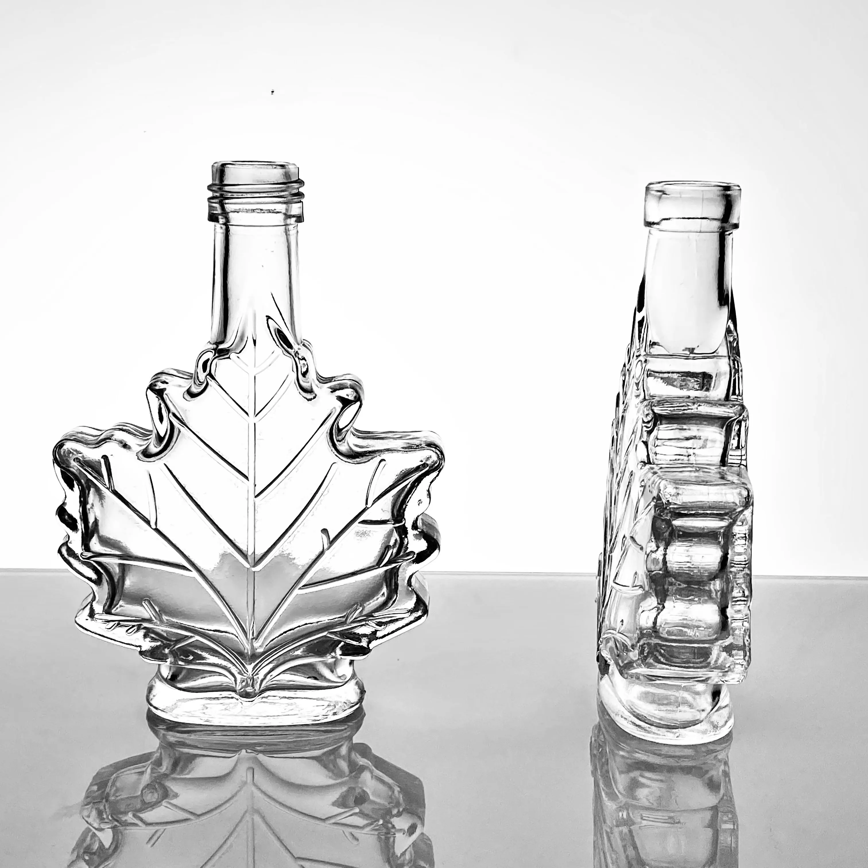 Unique shape with aluminum lid cork gift maple leaf custom empty mini 50ml100ml 250ml glass wine bottle transparent