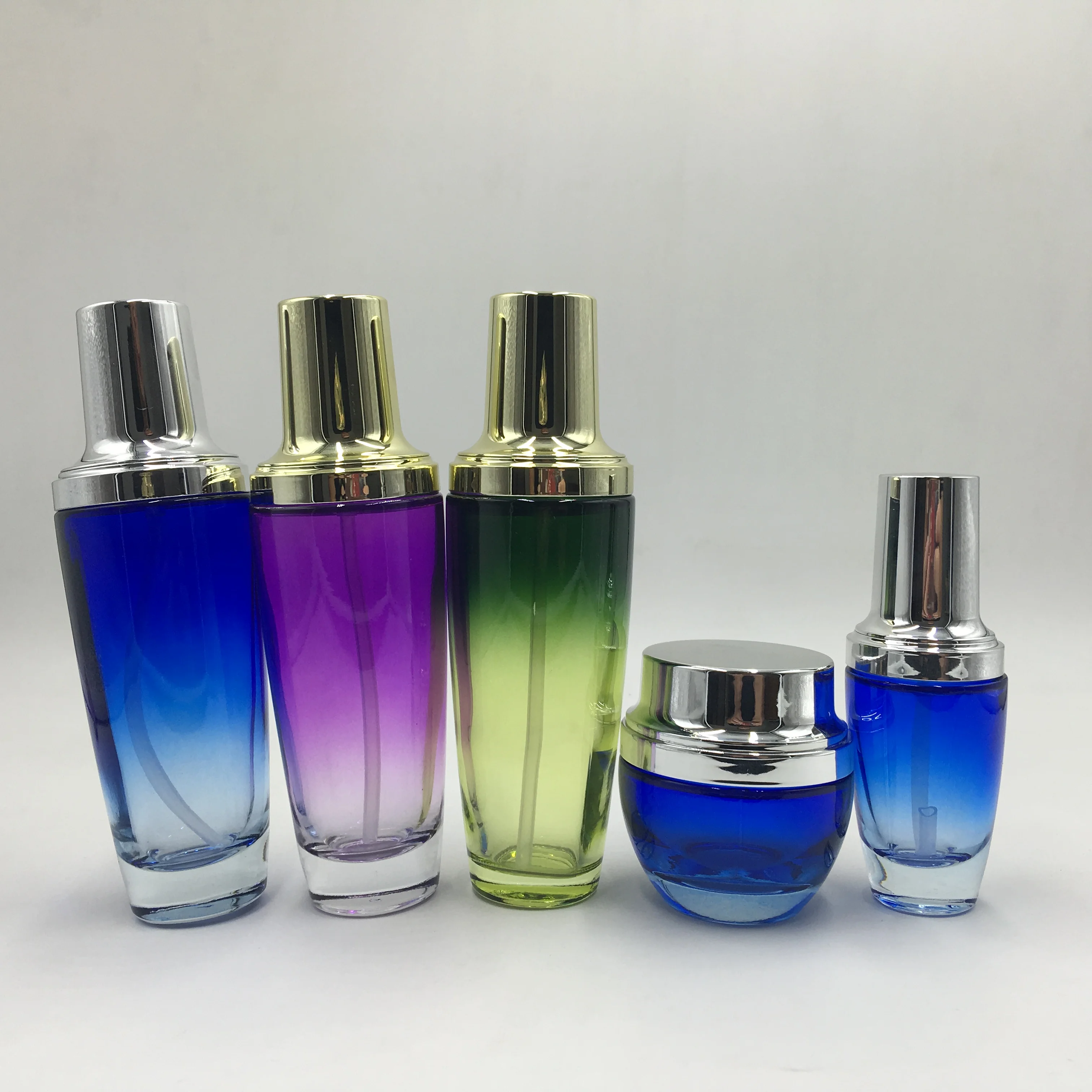 Luxury packaging transparent empty cosmetic sets glass bottle with pump