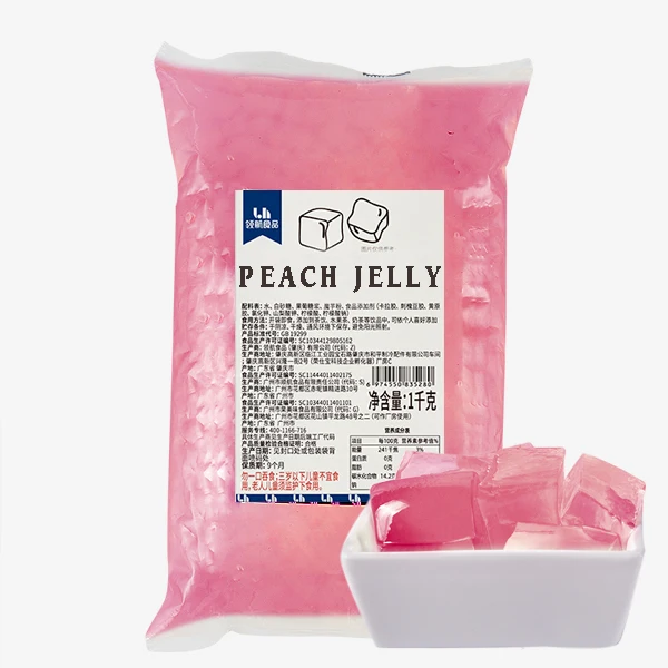 A gelatin topping of fruit pudding in a jelly fruit tea used at a wholesale beverage store