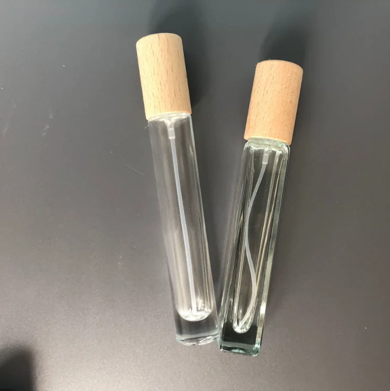 High Quality 10ml portable perfume cosmetics glass bottle with fine mist spray bamboo caps