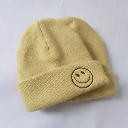 Beanies Knitted Beanie cotton double layer Beanie Hats Wholesale winter knitted hat with smile face embroidery.