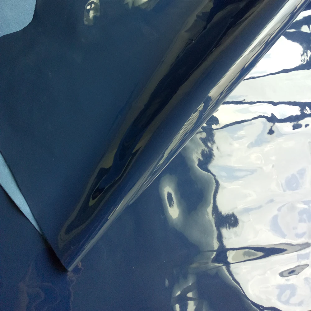 Patent glossy shoes and bag material fabric for bag and cosmetic