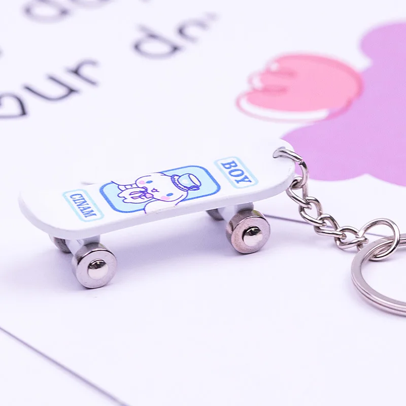 Wholesale creative alloy four-wheel double-warp scooter commemorative keychain sliding necklace pendant keychain
