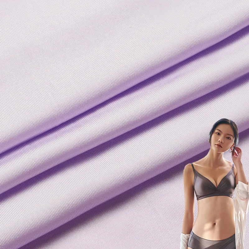 Single sided plain weave nylon 86% spandex 14% fabric 70/40N weft knitted glossy high elastic swimsuit fabric