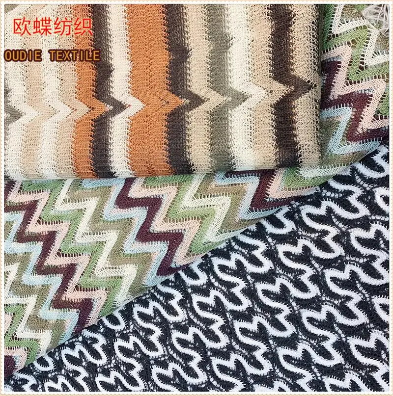 The manufacturer directly provides polyester yarn dyed blended polyester bright silk mesh knitted clothing fabric