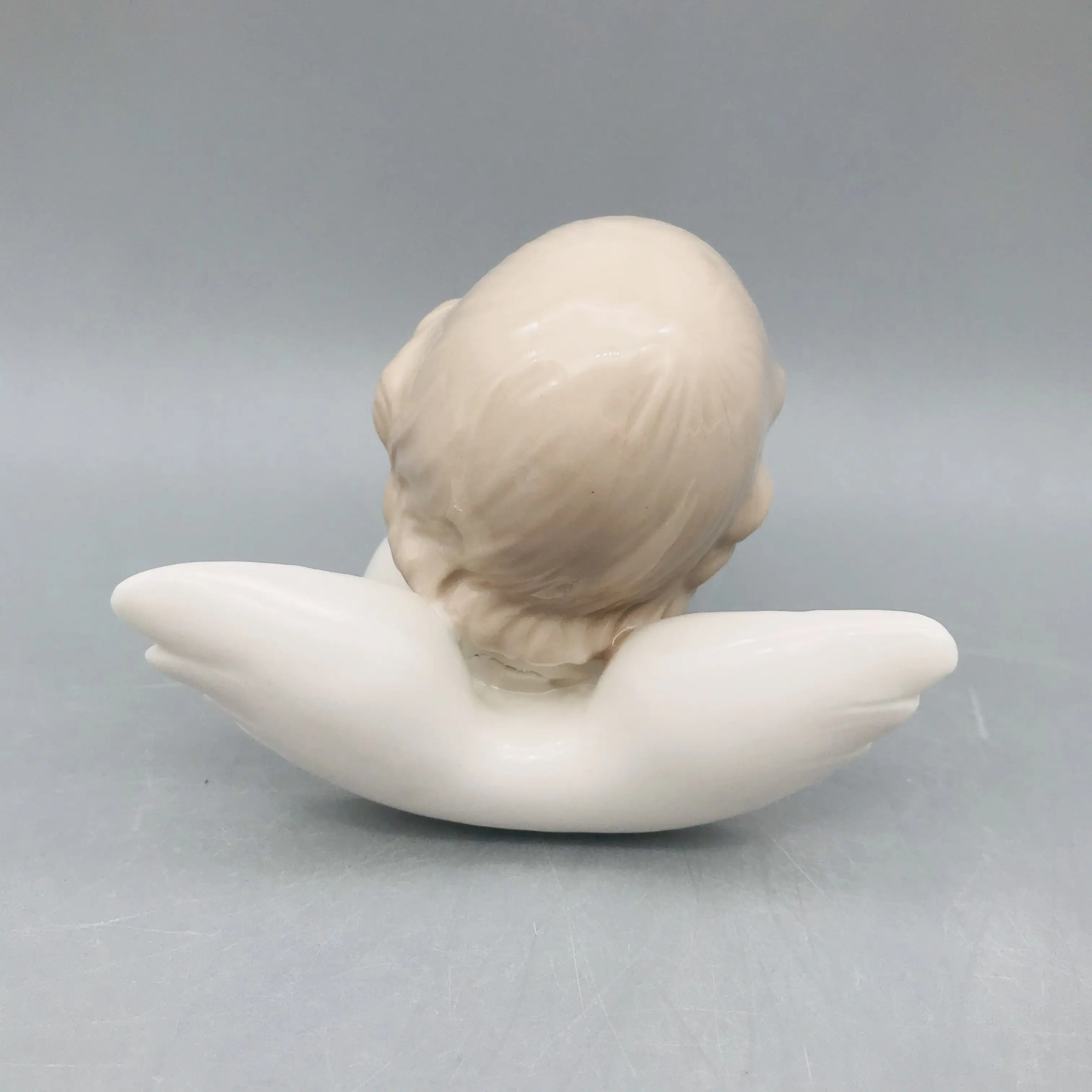 Factory directly supplies porcelain half-body angel figurine