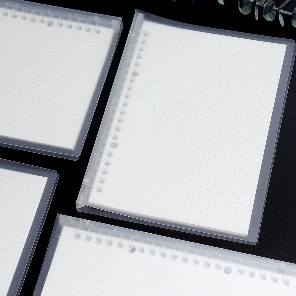 Wholesale PP cover school a5 spiral grid notebook with 4 pieces