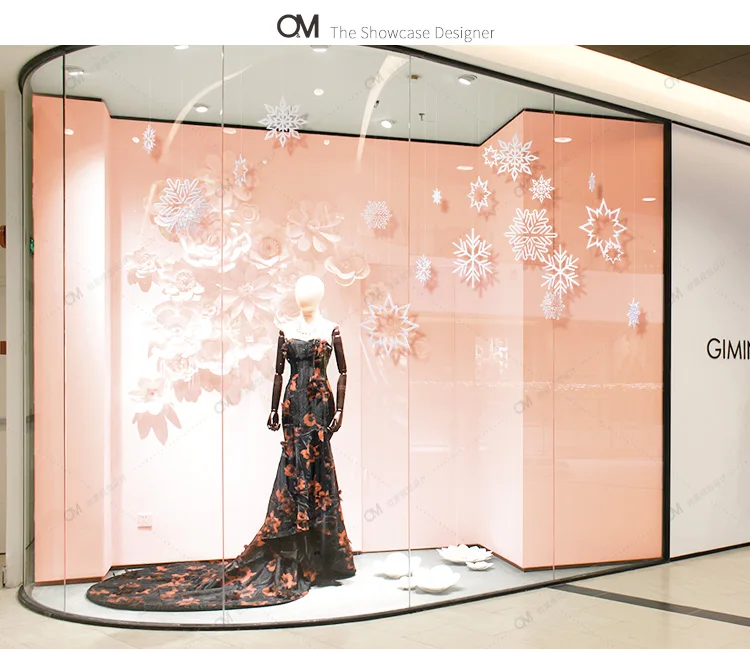 O&M Display Design White snowflakes Christmas window decorations Winter window display