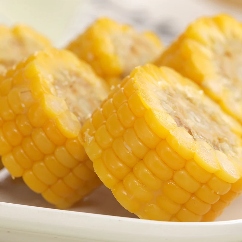 Sticky yellow corn cob vacuum packed fresh vegetable for soup
