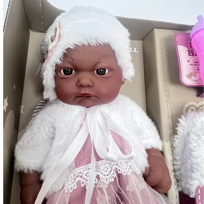 Factory offer Customized doll Service 10 inch reborn black dolls Vinyl African Gril Baby doll Pink Dress With Pacifier