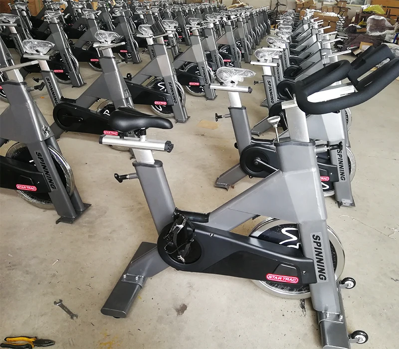 Wholesale price bodybuilding sports bicycle indoor Stationary gym fitness exercise trainer spinning bike magnetic commercial