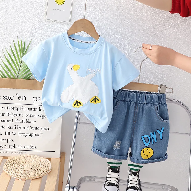 Clothing factory wholesale 2024 high quality fashion cartoon printed round neck children short sleeve and shorts two sets
